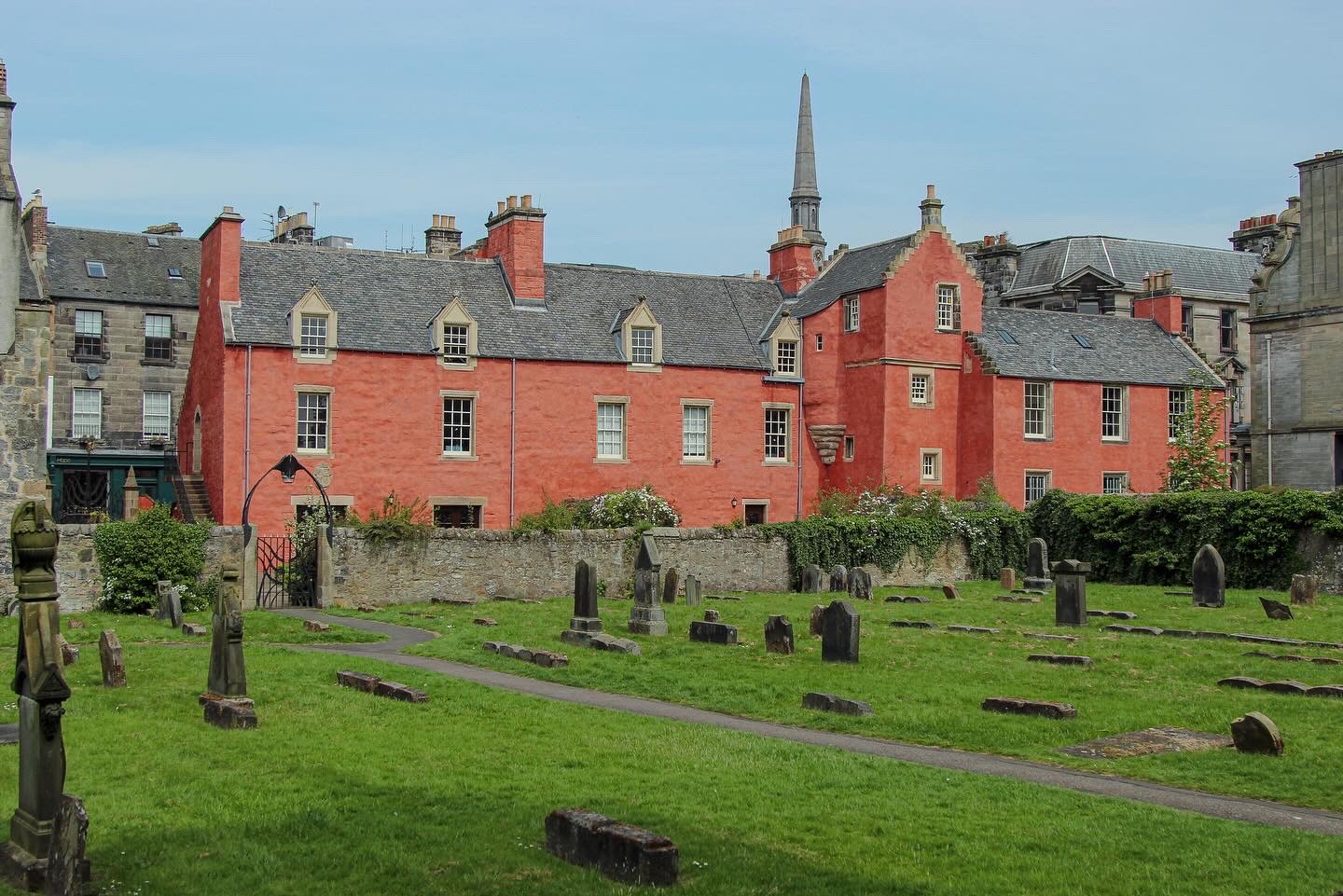 the exterior of Abbot House in Dunfermline. it is painted pink.